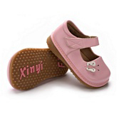 Childrens shoes with squeeky soles.