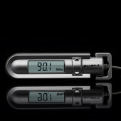 Eletronic device on black background with simulated LCD display and shadow.